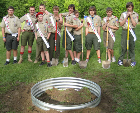Members pose with the new fire ring.